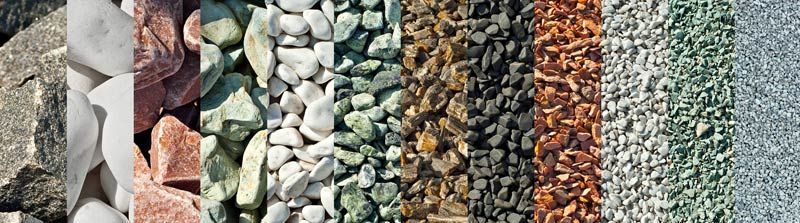 Close-up of various colored gravel: gray, white, red, green, brown, tan, and blue.