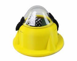 Yellow dice shaker with clear dome, containing dice.