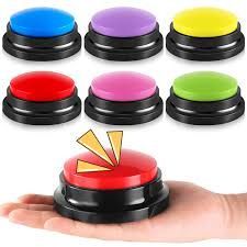 Image of several buttons  with black bases and colored red, blue, pink, green, purple, and yellow tops.