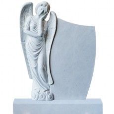 Ein Grabstein mit einer Engelsstatue darauf.