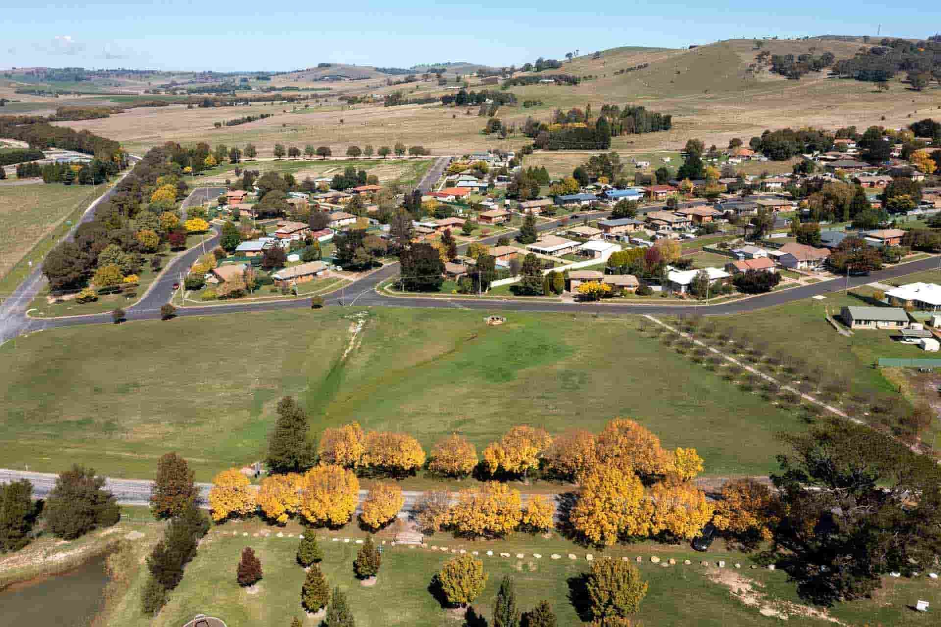 A Lake Surrounded By Trees And Grass — Regional Concreting Solutions In Blayney, NSW