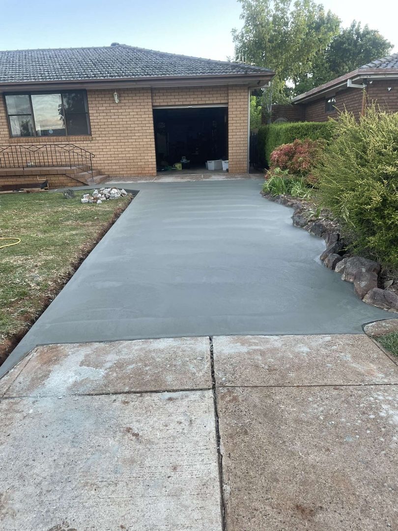 House With Concrete Driveway — Regional Concreting Solutions In Orange, NSW