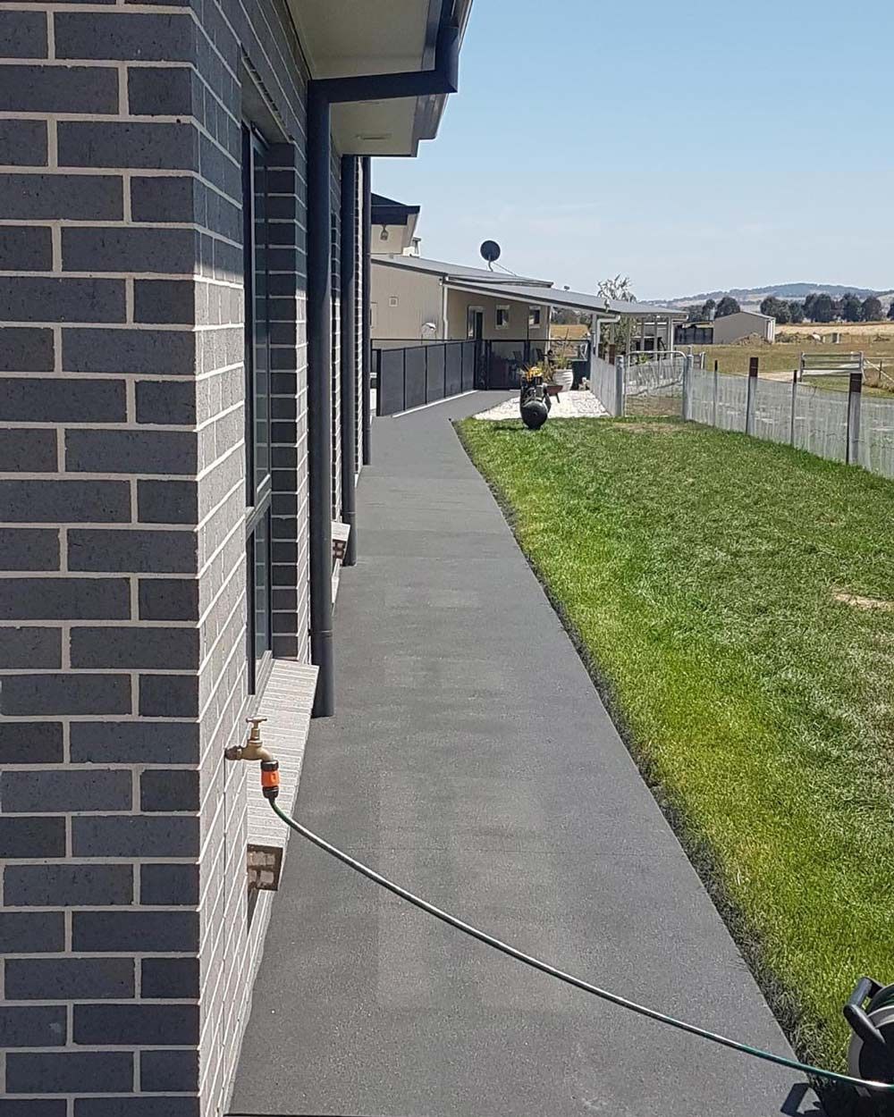 House With Concrete Path— Regional Concreting Solutions In Orange, NSW