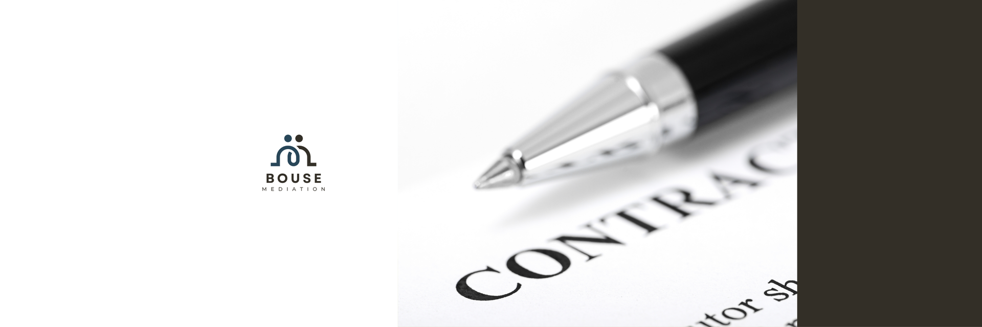 Pen writing on a contract document with the word “CONTRACT” visible and a small logo on the left