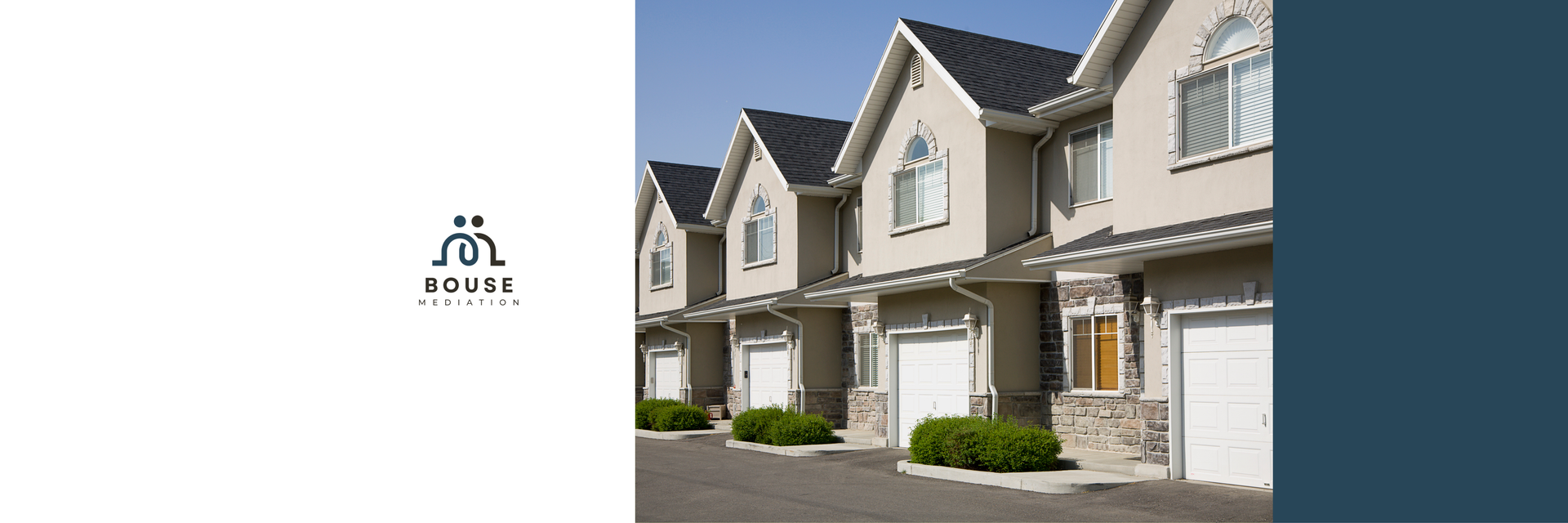Suburban row of beige townhouses with garages and a small logo on a white panel to the left