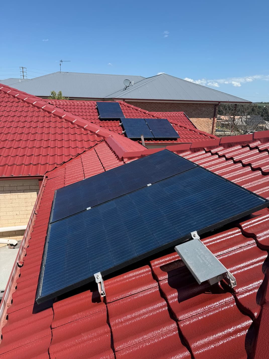A roof restoration in moss vale with solar panels
