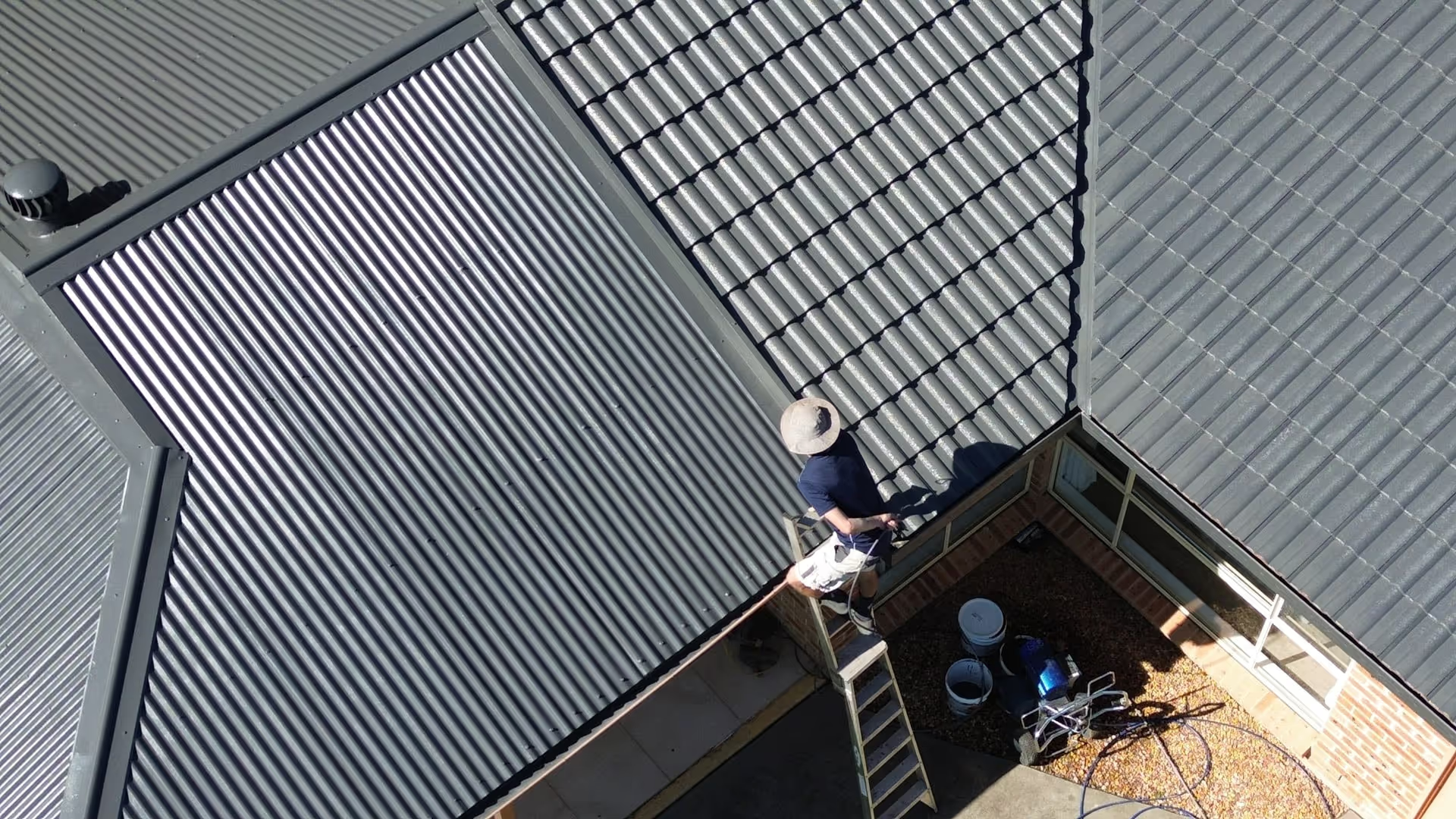 A person inspecting a Sydney roof