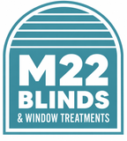 M22 Blinds & Window Treatments logo in teal and white with arched striped design