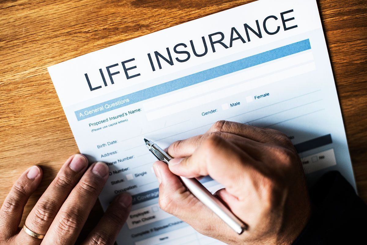 young woman sits happily on boat covered by insurance
