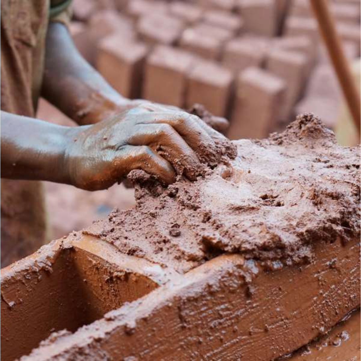 Moulding mud bricks