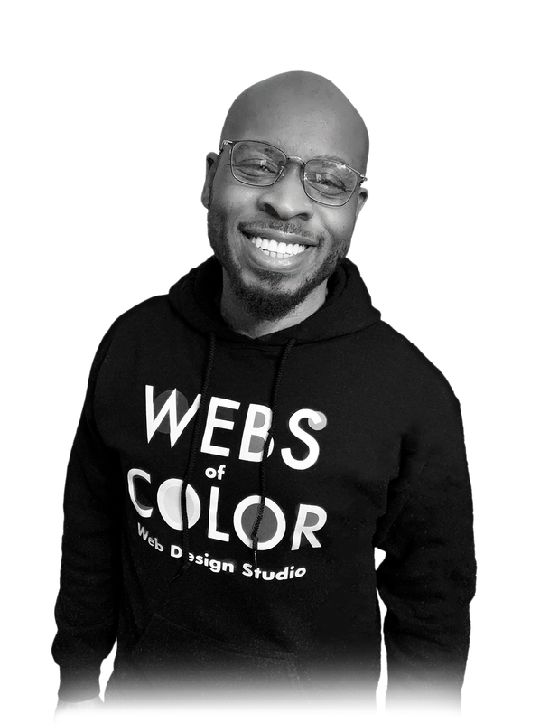 Black-and-white portrait of Corey Clauden-Cross, founder and creative director of Webs of Color