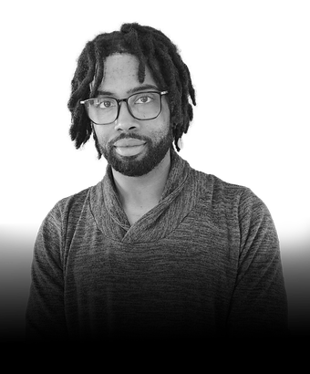 Black-and-white portrait of Brandon Cook, Web Designer at Webs of Color