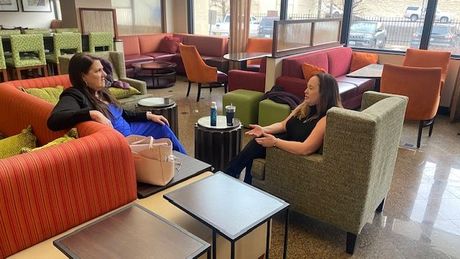 Wendy is discussing mindset skills with a woman