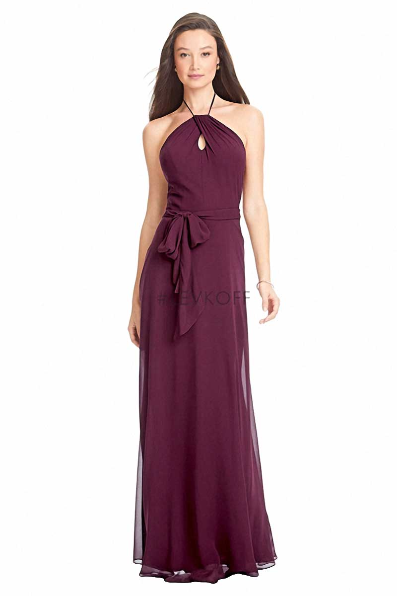 Long burgundy halter-neck evening gown with waist tie on a white background