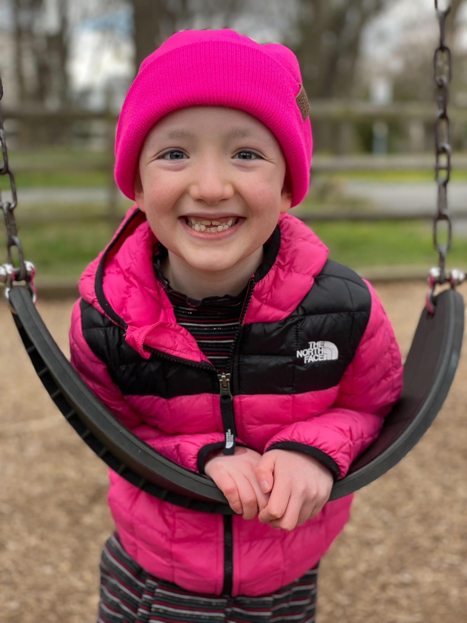 Kasey on a swing