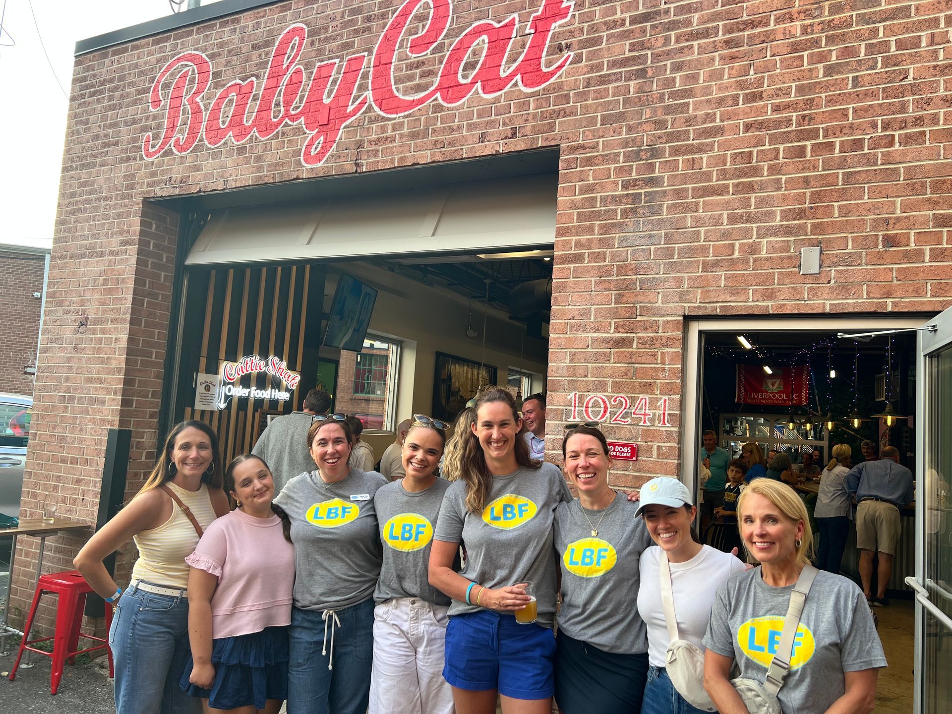 LBF Staff outside BabyCat bar for sponsorship event