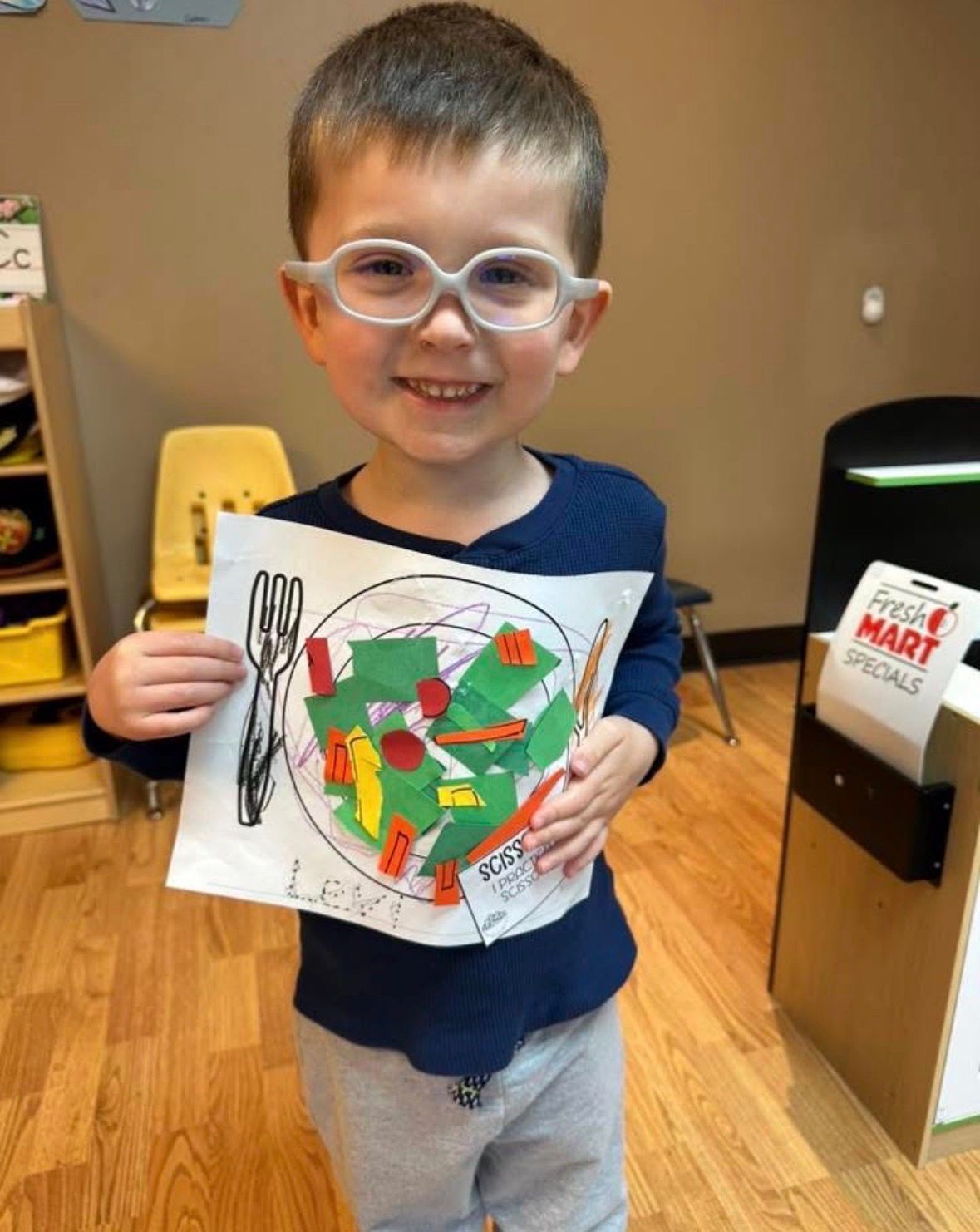 LBF Levi Zuckerman holding a picture he drew
