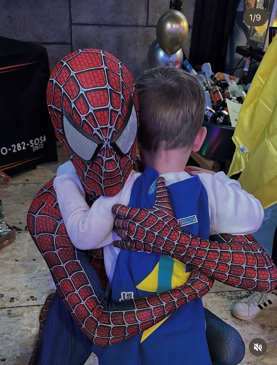 LBF Hero Levi Zuckerman hugging Spiderman