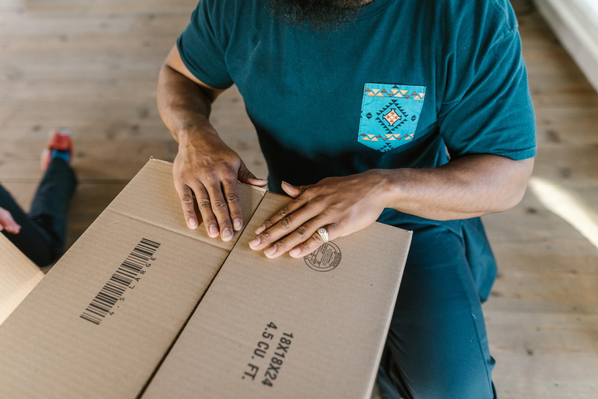 Man closing the box