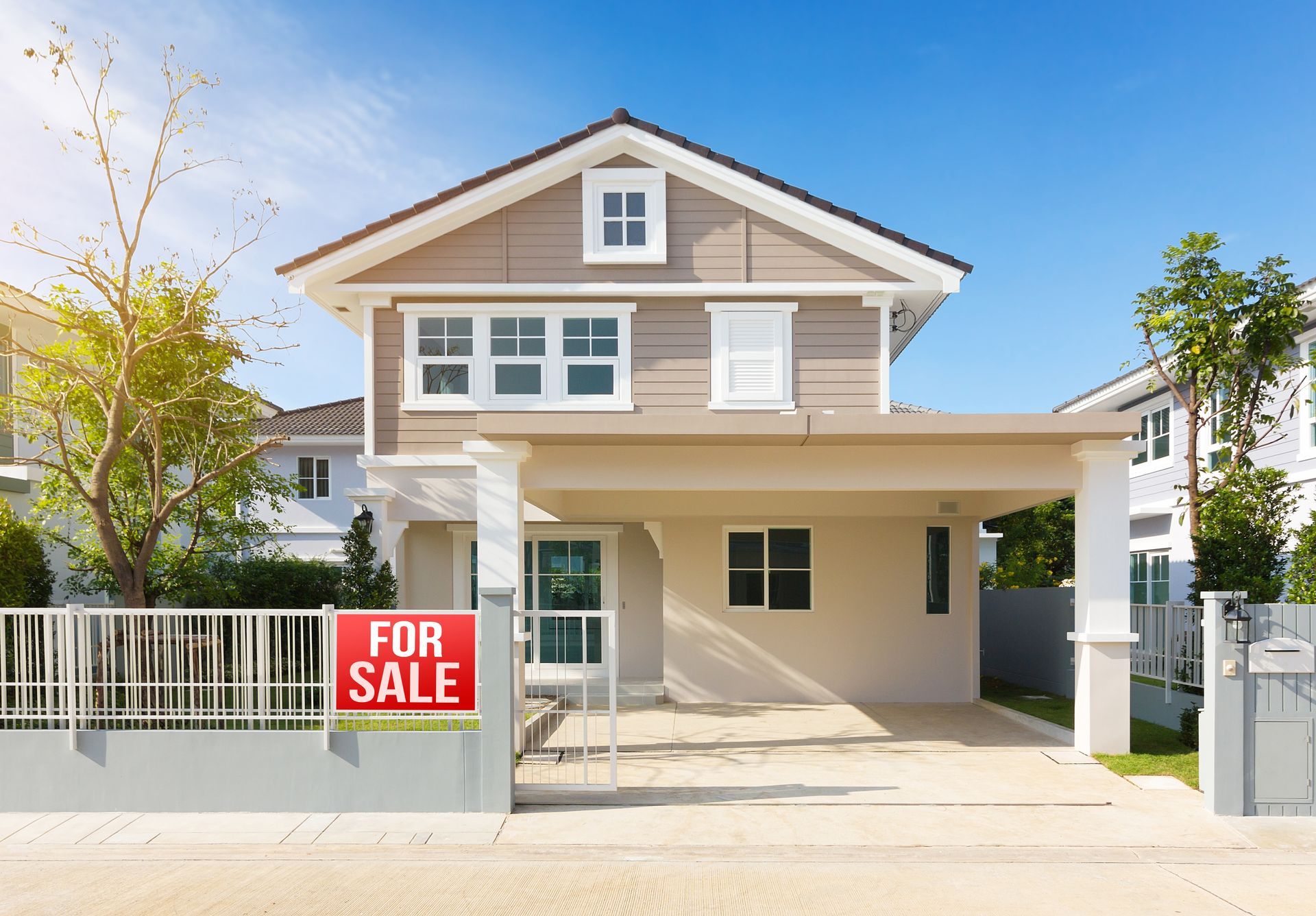 A spacious home with a for sale sign