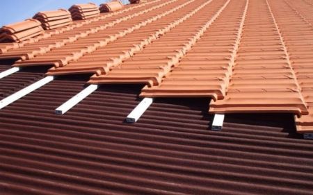 instalar onduline bajo teja en la cubierta de vivienda unifamiliar en Huesca