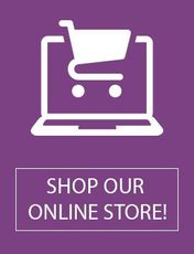 A laptop with a shopping cart on it and the words `` shop our online store ''.