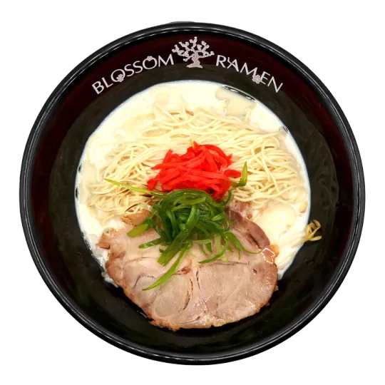 Bowl of ramen noodles with pork, green onions, and red pickled ginger on a black bowl