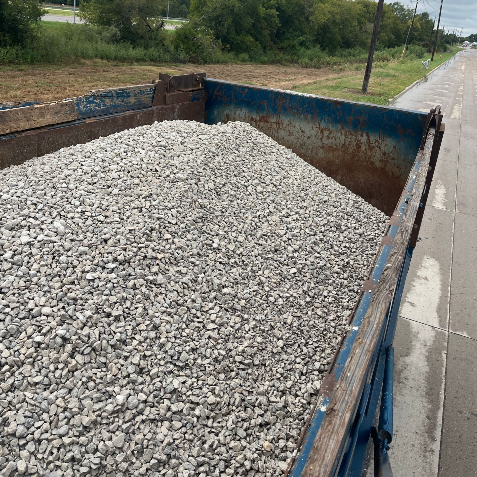 A close up of a pile of white gravel.