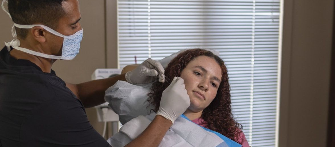 Kansas City's only triple board-certified, Harvard-trained Mohs surgeon. Same-day reconstruction at our AAAHC-accredited surgical center. 900+ five-star reviews.