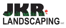 A logo for jkr landscaping llc with grass and flowers