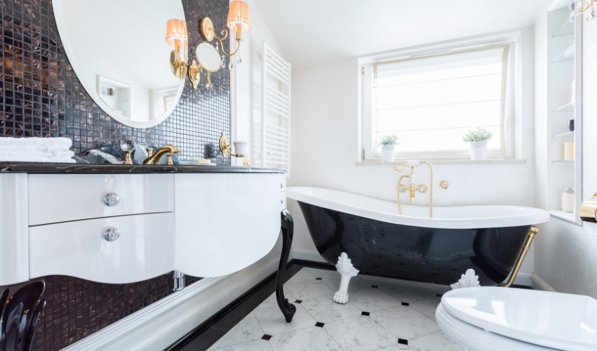 A bathroom with a sink , toilet , bathtub and mirror.