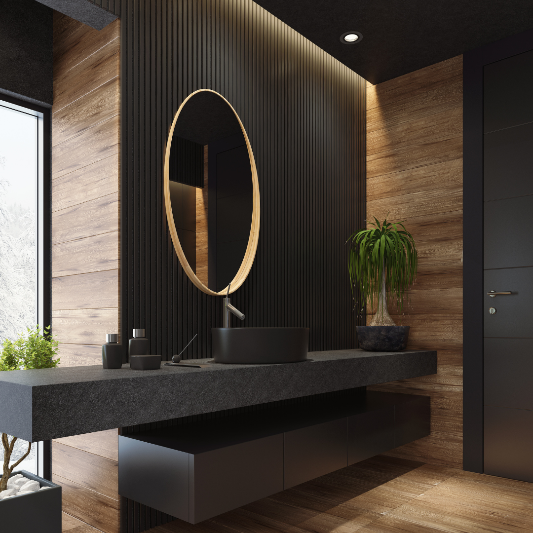 A bathroom with a toilet , sink , mirrors and a walk in shower.