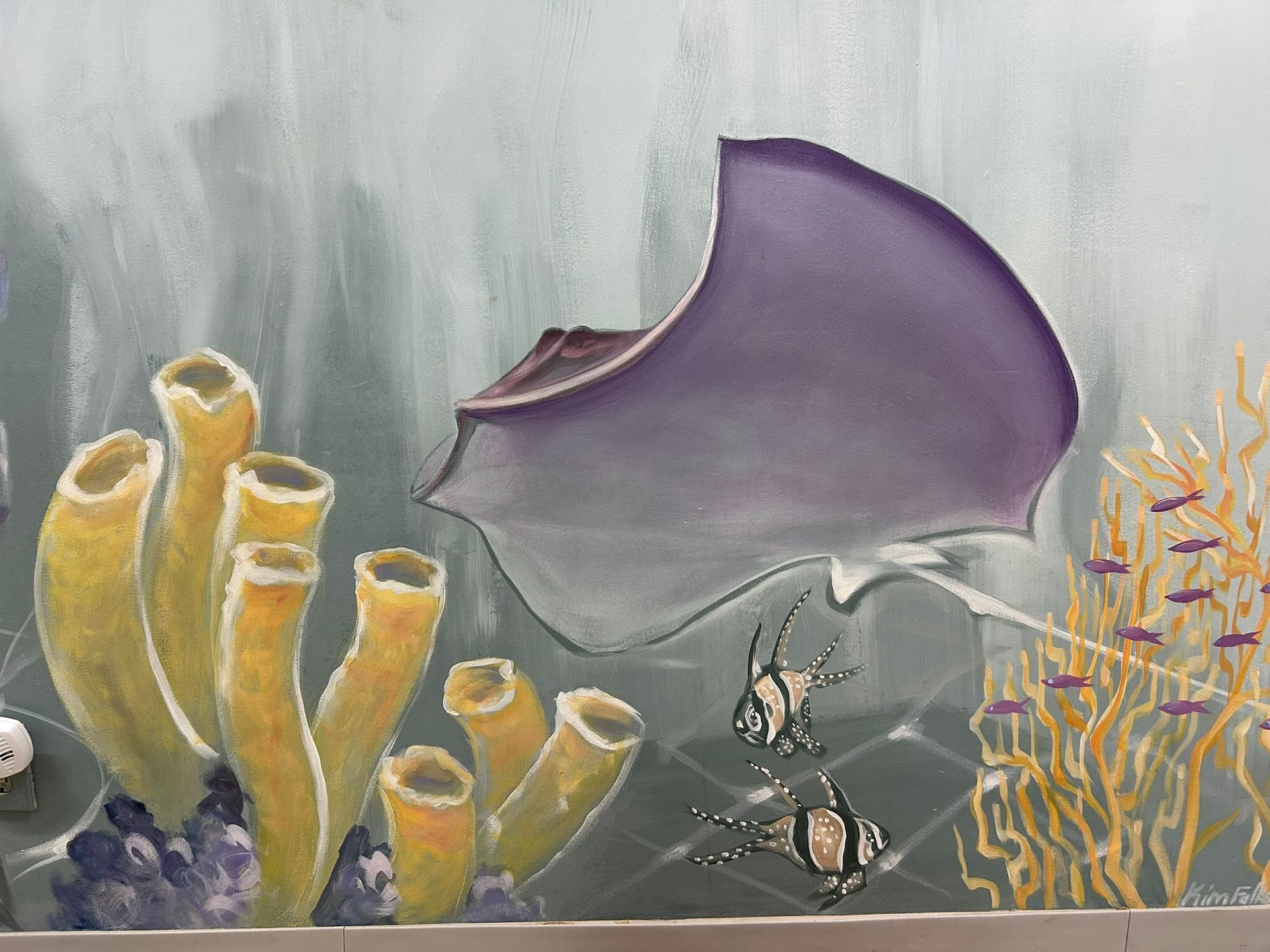 Artist drawing of manta ray in ocean.