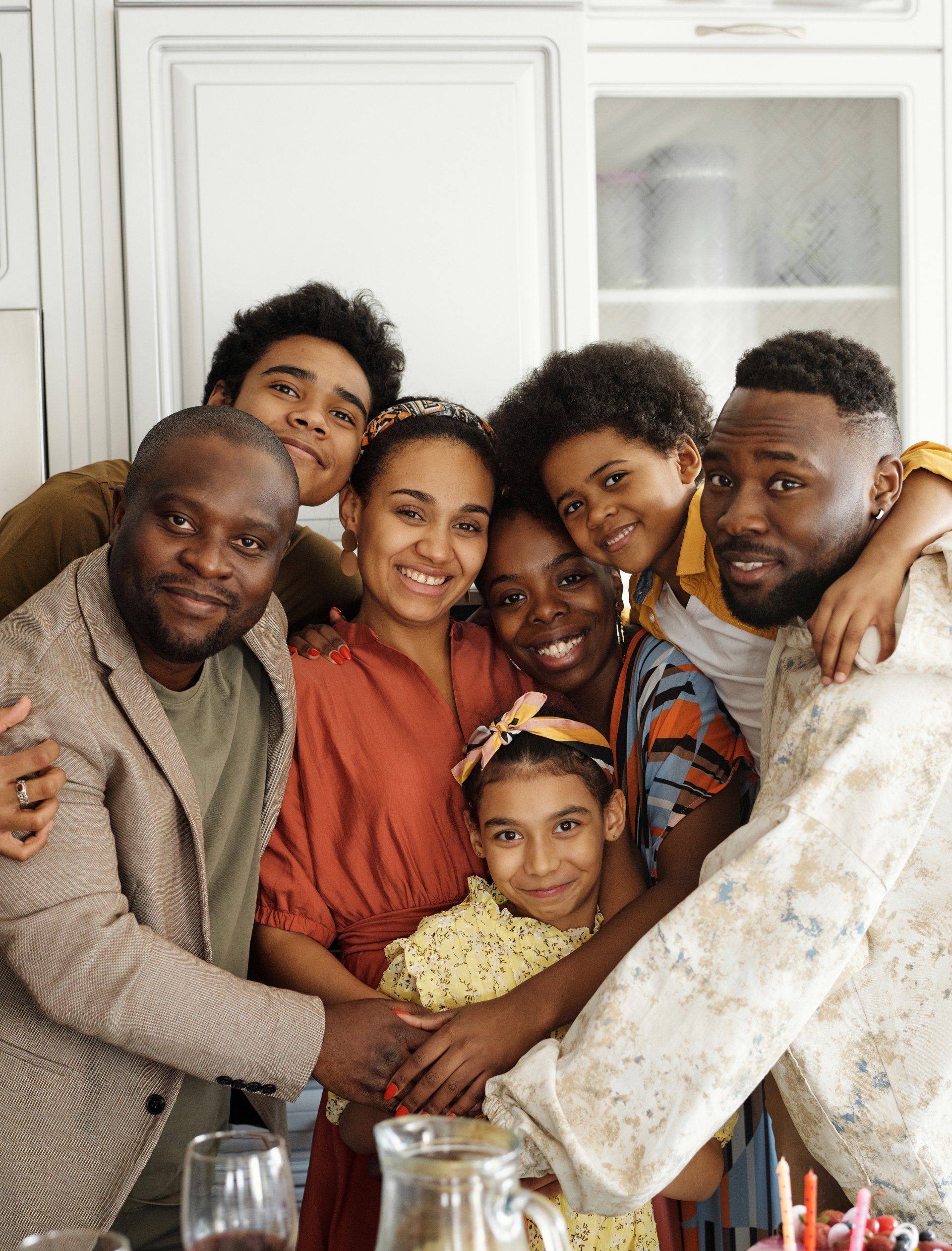 A group of mixed-aged people standing close together.