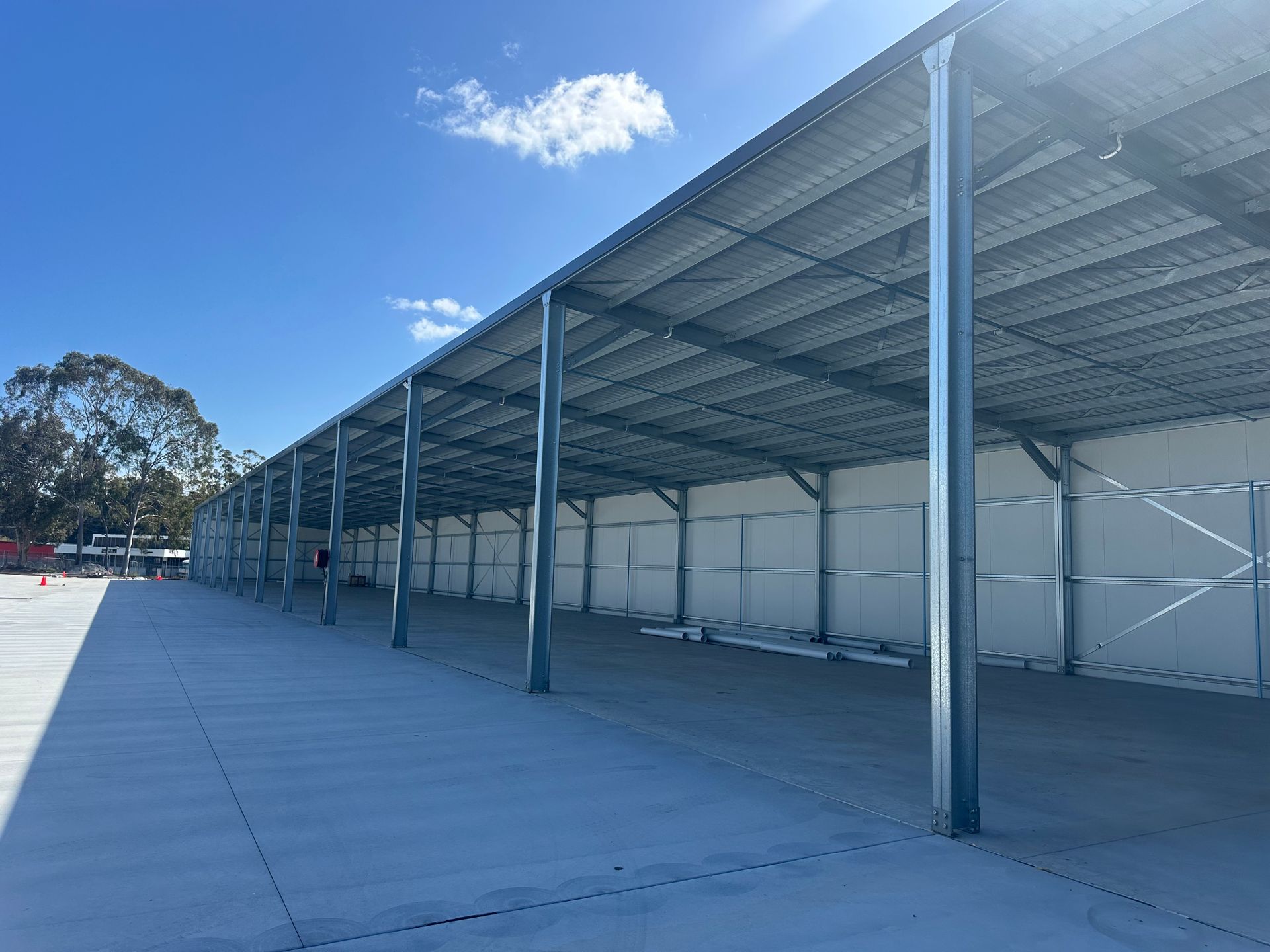 Long Metal-framed Storage Structure With Concrete Floor — Midcoast Premium Caravan Storage in Forster, NSW