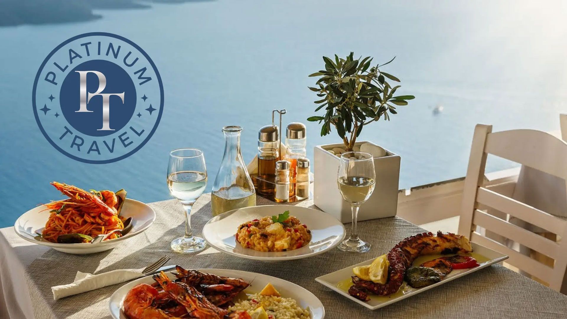 Outdoor seaside dining table with seafood dishes, wine glasses, and a potted plant at sunset Outdoor seaside dining table with seafood dishes, wine glasses, and a potted plant at sunset