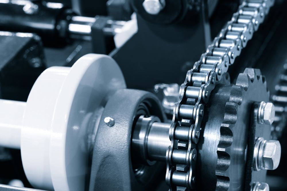 A Close Up Of A Machine With A Chain And Gears — NQPT In Garbutt, QLD