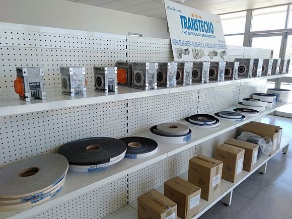 A Store Shelf Filled With Boxes And Rolls Of Tape — NQPT In Garbutt, QLD