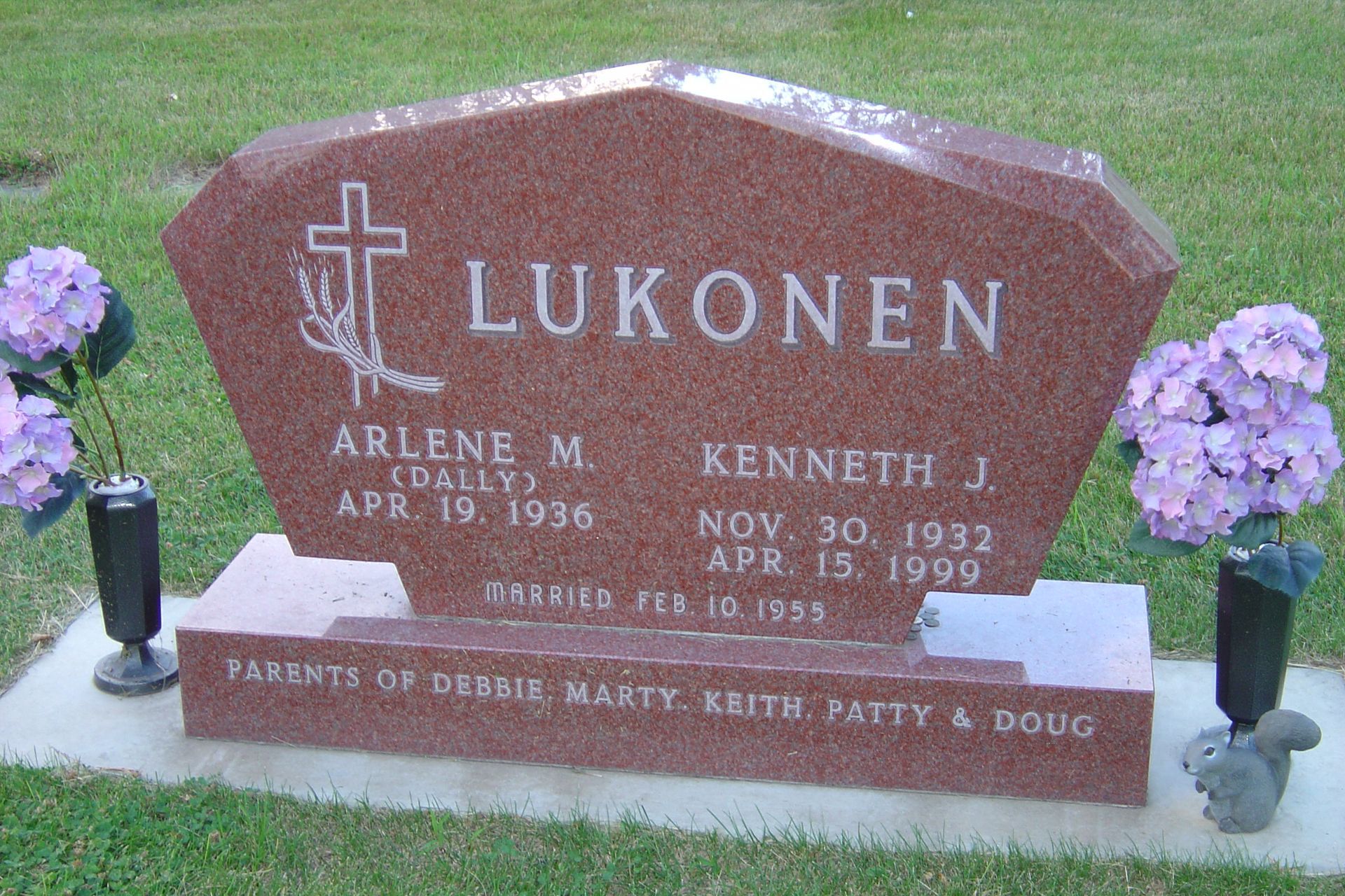 Red granite headstone with 