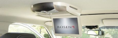 A car with a monitor hanging from the ceiling