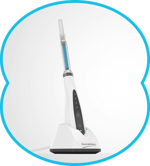 Electric toothbrush standing upright in a charging base, white and black with blue accents.