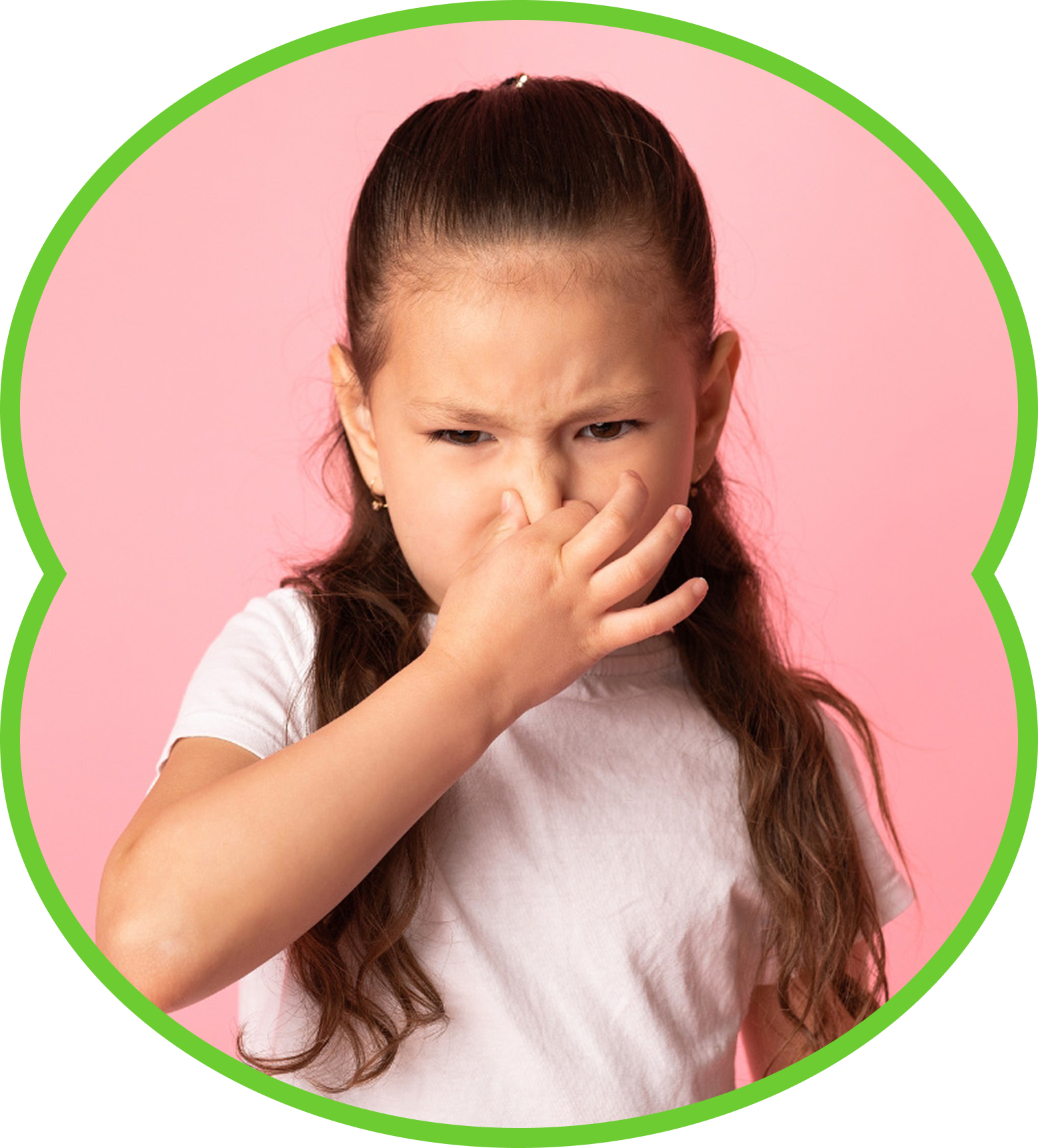 Child covering nose and mouth against a pink background, framed by a green border