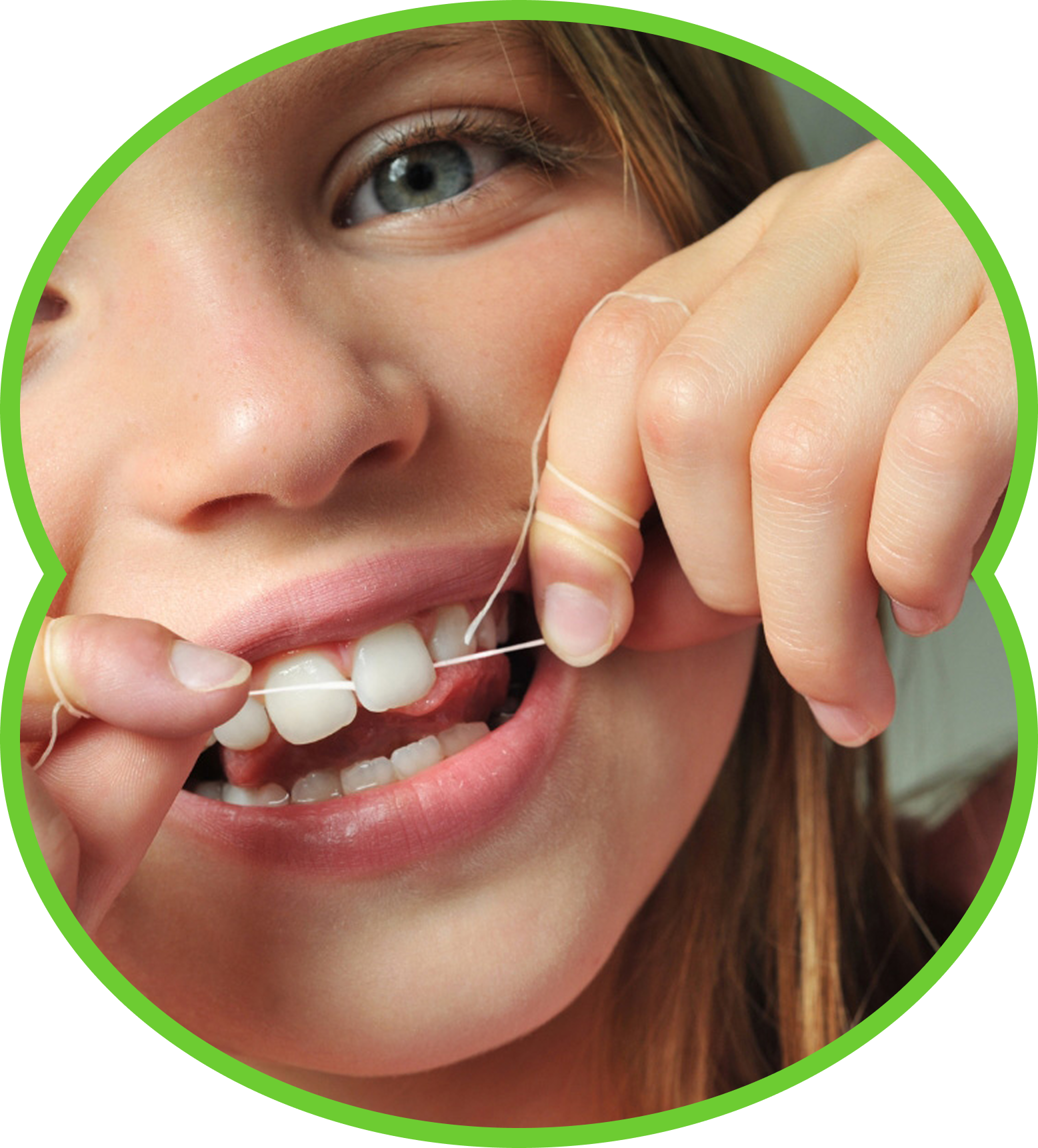 Person flossing teeth with a smile, close-up with a green circular border