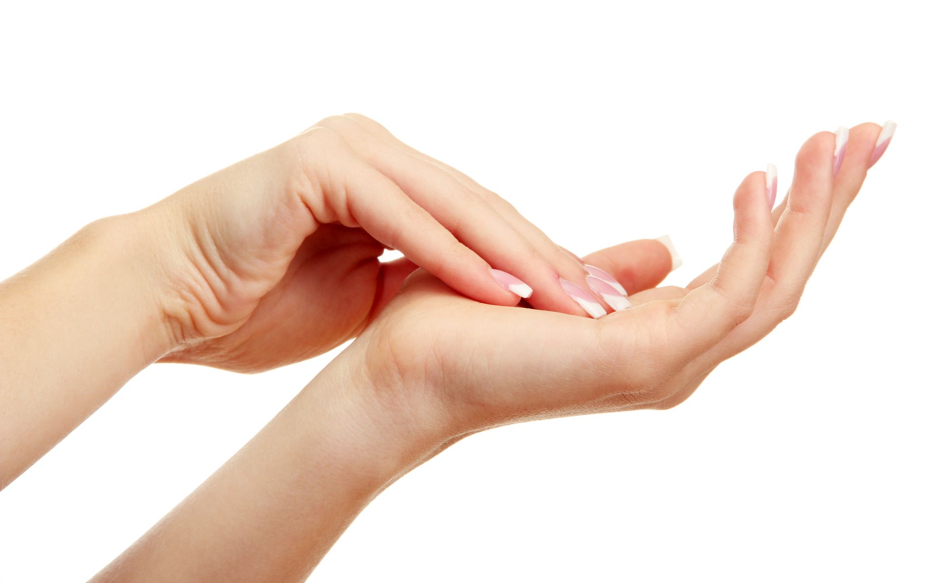 Two hands gently touching, one palm up and one resting above it on a white background