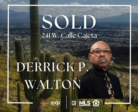 Sold real-estate sign for 241 W. Calle Cajeta, with portrait of Derrick P. Walton and desert mountain backdrop.