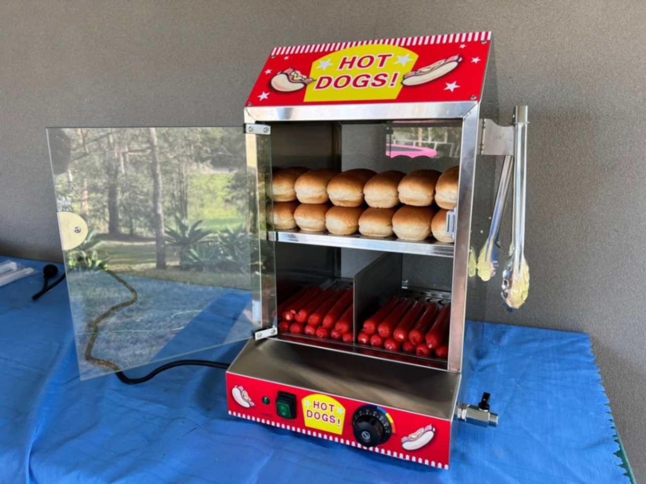 Hot Dogs And Breads Kelp In A Machine — Party Equipment Hire in Gympie, QLD