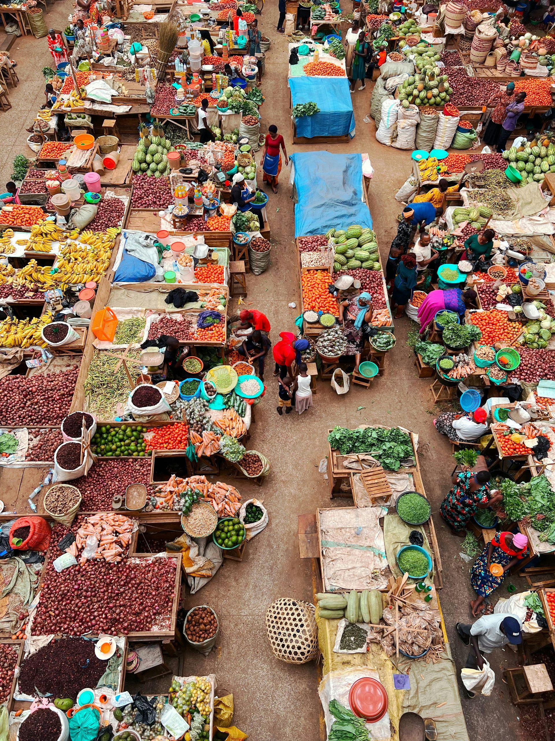 An aerial view of a market filled with fruits and vegetables
