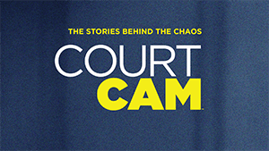 A blue background with the words Court Cam on it.