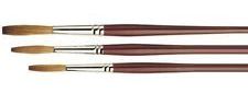 Photo of three round brushes.