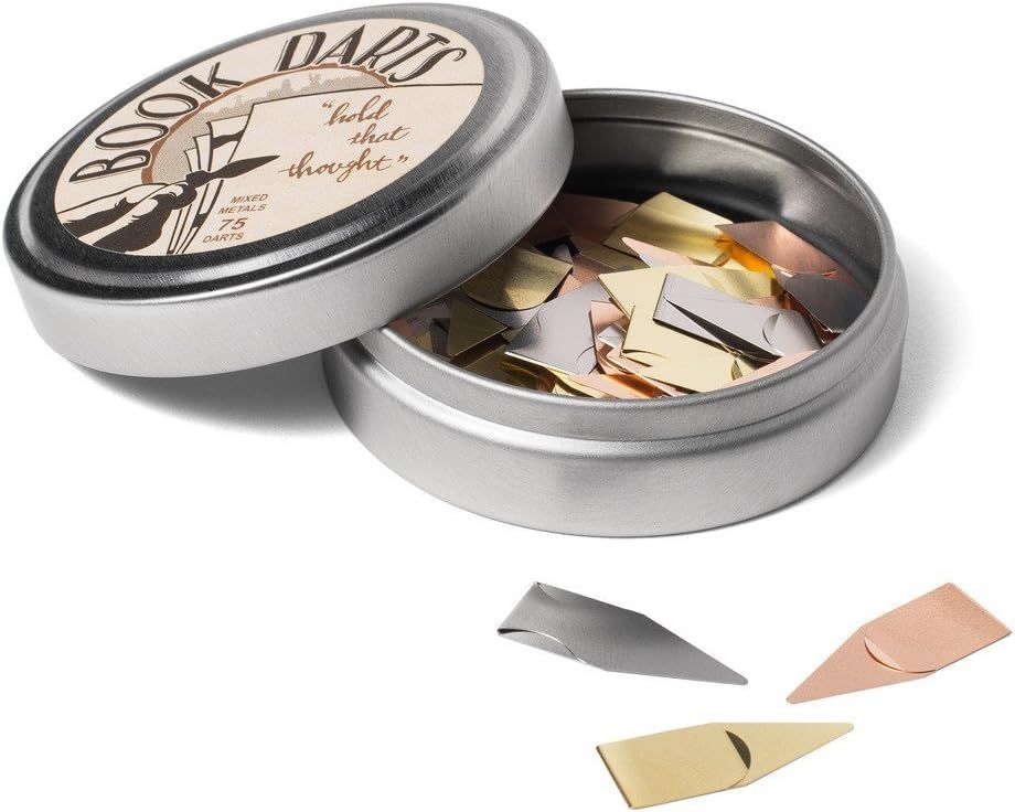 Photo of paper pins in golden, silver and copper colour.